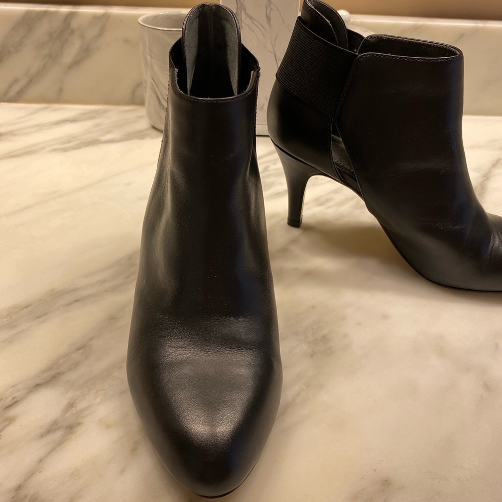 Cute little black booties. Italian designed. Used. Like new condition with box.